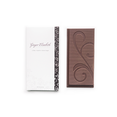 Ginger Elizabeth Chocolates Coffee, Hazelnut and Brown Sugar Chocolate Bar and packaging on white background.