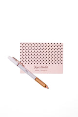 Ginger Elizabeth Chocolates Pink gift note card withwhite pen on white background