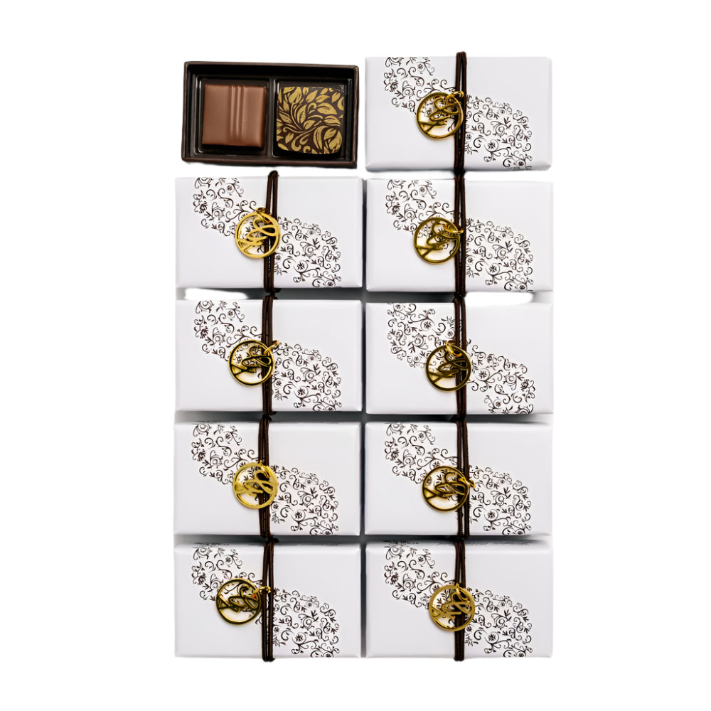 Set of ten chocolate boxes with decorative packaging on a white background