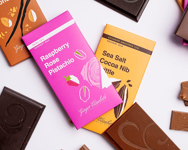 Chocolate bars with colorful packaging on a white background