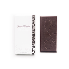 Ginger Elizabeth Chocolates Vanilla Bean Toffee and Roasted Almond Chocolate Bar and packaging on white background