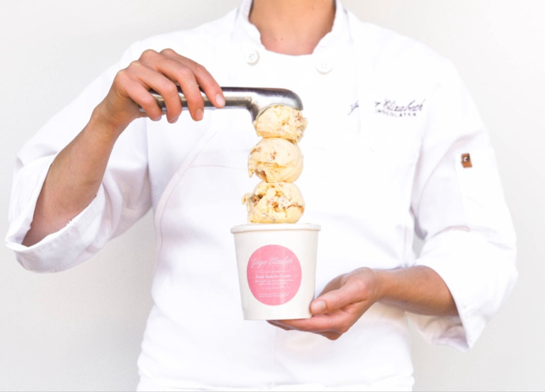 Ginger Elizabeth Chocolates Apricot Cobbler ice cream scoops balanced over pint.